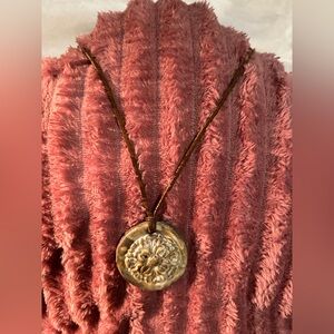 Tan Medallion Necklace with Intricate Design